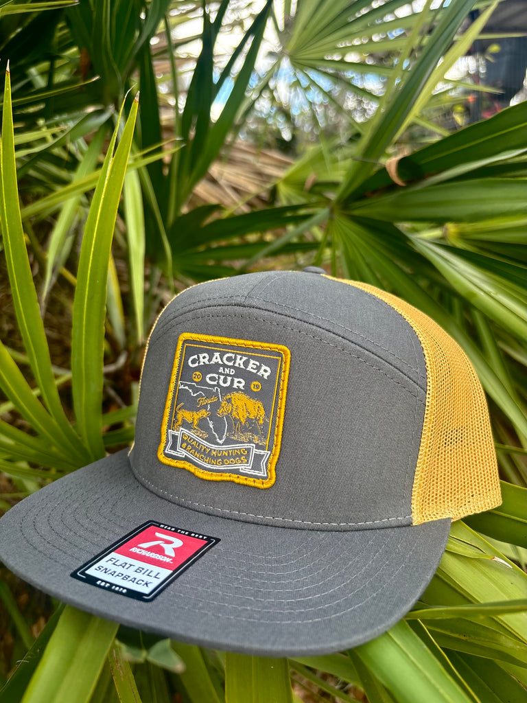 Bayed Up Patch 7-panel trucker hat in charcoal and old gold