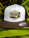 Cracker and Cur Diamond Logo 7-panel trucker hat in brown and white