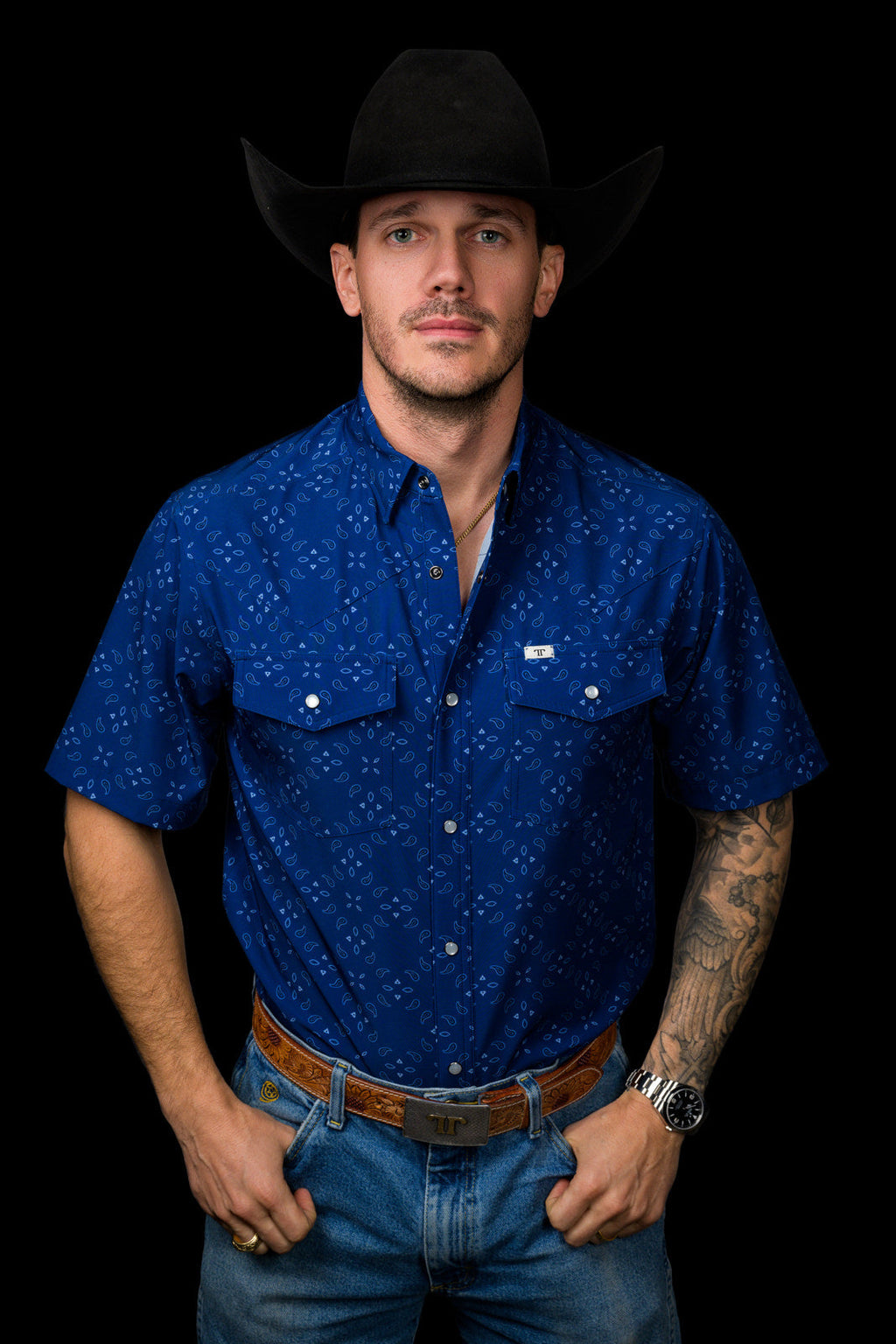 Ferrell men's Tanner blue short-sleeve pearl snap shirt front view