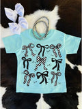 Girls' turquoise T-shirt with black and white checkered bow graphics